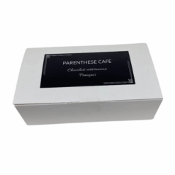 Ballotin de ganaches et chocolats noir, blanc et laite